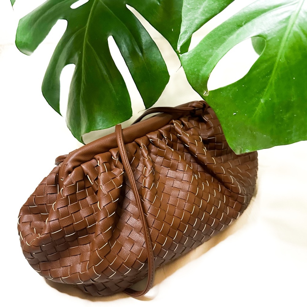 The Pouch Bag in coffee color.